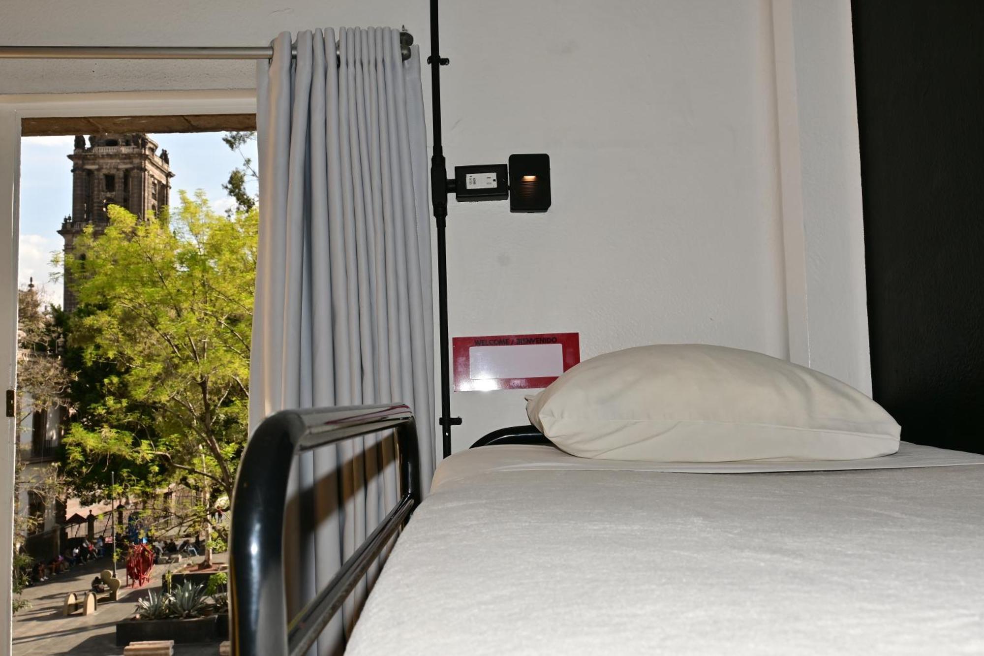 Bed in 6-Bed Female Dormitory Room Interior Shared Bathroom